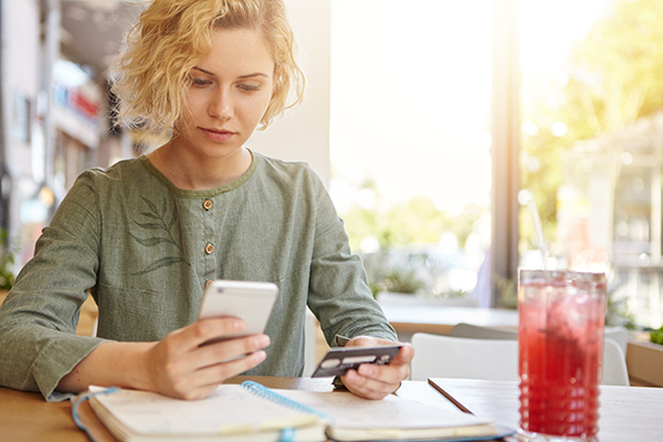 woman looking at phone