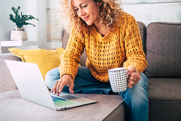 Woman looking at laptop