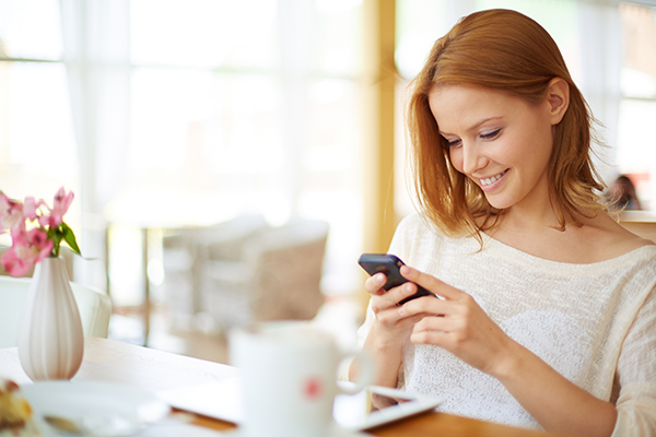 woman looking at phone